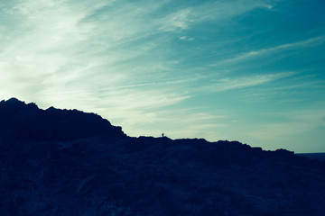 landscape silhouette with blue sky and nice clouds