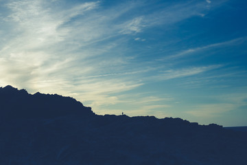 landscape silhouette with blue sky and nice clouds
