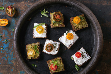 Small sandwiches with tomatoes