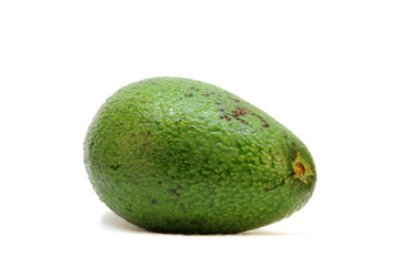 ripe green soft avocado isolated on a white background.
