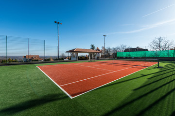Tennis court at a private estate in the twilight and magic sky - 118001476
