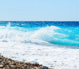 Powerful Waves crushing on a rocky beach