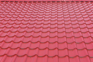 red glossy rooftop tiling