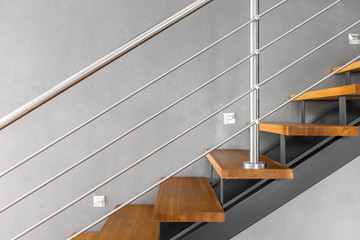 Simple staircase with chromed railing idea