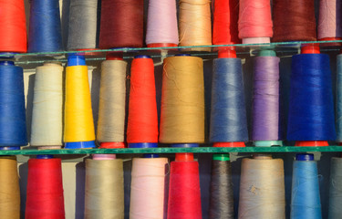 Multi-colored coils of threads