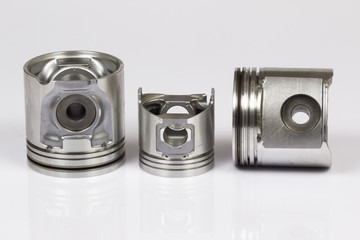 auto piston parts white background isolated