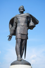 The Sculpture of Alexander Nevsky against the blue sky closeup, Veliky Novgorod, Russia