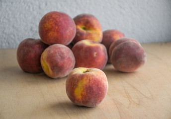 Group of fresh peaches bought on local market.