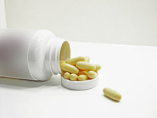 White pills an pill bottle