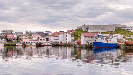 Fototapeta na wymiar HONNINGSVAG, NORWAY- JULY 24, 2016: Port of Honningsvag in Finnm