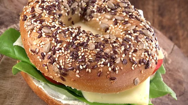 Portion of rotating Bagel with Cheese (not loopable) as 4K UHD footage