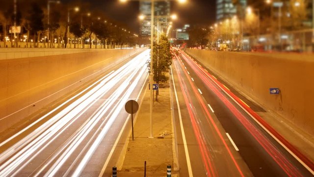 rush of night time traffic on motorway