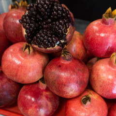 Pomegranates at the Market. Group of pomegranates. Pomegranate c
