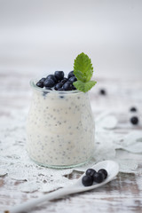 Fototapeta na wymiar Healthy breakfast or morning snack with chia seeds vanilla puddi