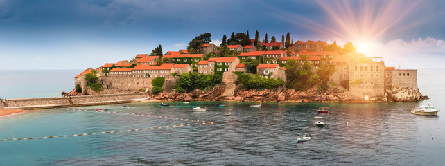 Fototapeta na wymiar Panoramic landscape of the Sveti Stefan island resort. Montenegro. Adriatic Sea.