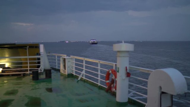 View from vessel board on the cargo passenger ferry boat Glykofilousa III crossing Kerch Strait in the early morning 