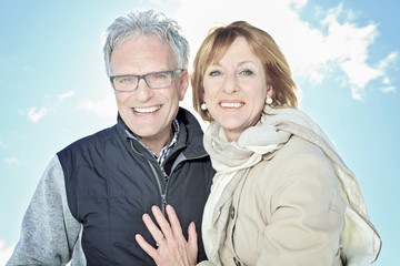 Portrait of happy senior couple in winter season