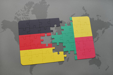 puzzle with the national flag of germany and benin on a world map background.