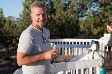 Fototapeta premium handsome man drinking wine