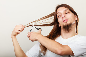 Fototapeta premium Barber cutting hair