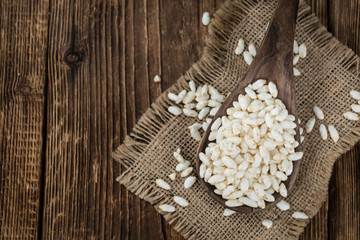 Old wooden table with puffed Rice