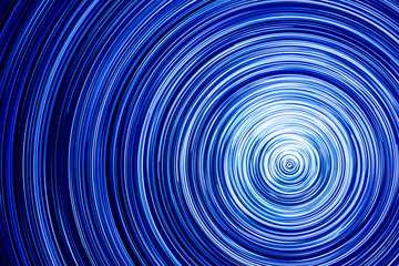 Abstract rotating neon lights texture.