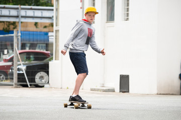 Boy Riding Skateboard