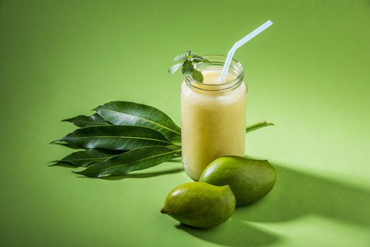 Green mango juice also known as kairi panha, aam panna, Mango Pahna, green mango drink, Fresh green mango smoothie with fresh green mangos