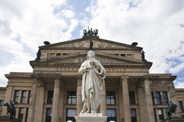Fototapeta na wymiar Schiller statue in front of Konzerthaus (Concert House) in Berlin