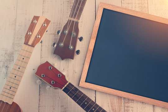 empty chalkboard and ukuleles.jpg