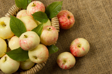 ripe apples in a beautiful wicker basket