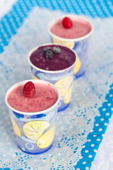 Homemade berry ice-cream in paper cups