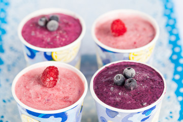 Homemade berry ice-cream in paper cups