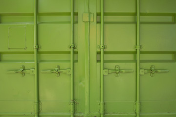 Side profile view of green cargo freight container isolated