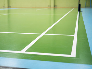 Indoor badminton court, selective focus