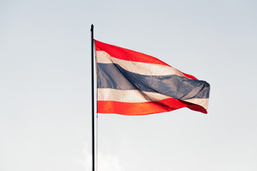 Thailand flag on  top of the pole in a windy day dusk
