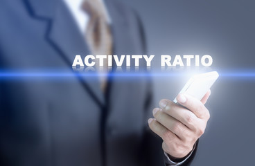 Businessman pressing hand Activity Ratio word on virtual screen. Can bring to the medium of your ad.