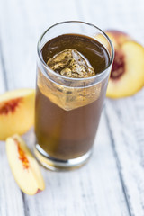 Tasty peach ice tea (selective focus)