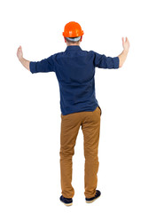 Back view of builder in helmet shows thumbs up.   Rear view people collection.  backside view of person.  Isolated over white background. The engineer in a blue shirt with the sleeves rolled up and a