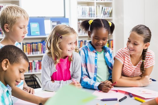 Kids interacting with each other in library