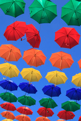 Fototapeta na wymiar Colourful umbrellas urban street decoration