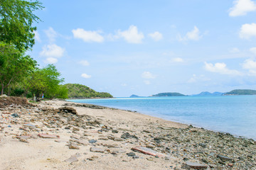 Beach view see the sky and mountains.