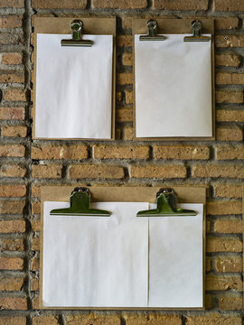 Clipboard with a sheet of paper