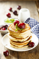 Pancakes with fresh cherry