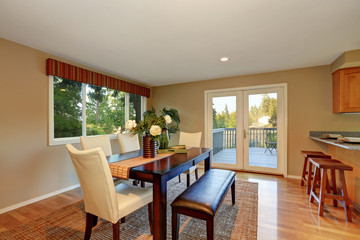Elegant dining room with fresh flowers on the table