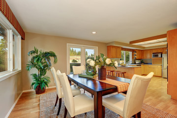 Elegant dining room with fresh flowers on the table
