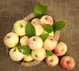 ripe apples in a wicker basket