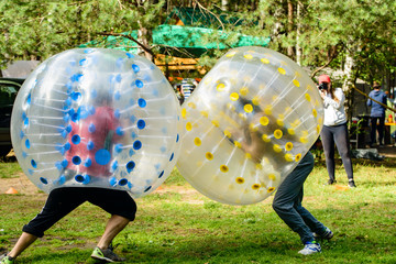 people play bumperball outdoor, Zorbsoccer