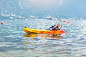 Mature man kayaking on the sea
