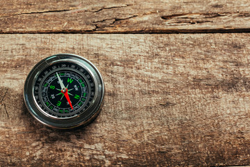 Compass on a wood deck